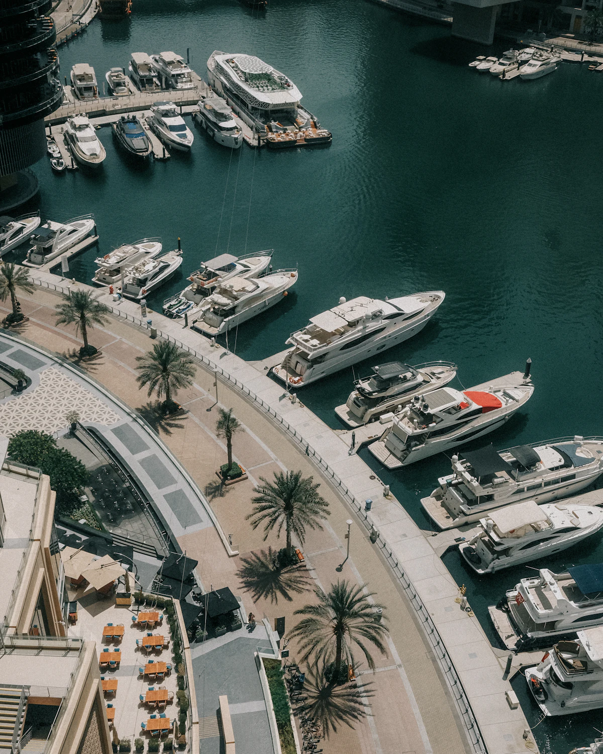 Yachts in Dubai Marina below residential towers