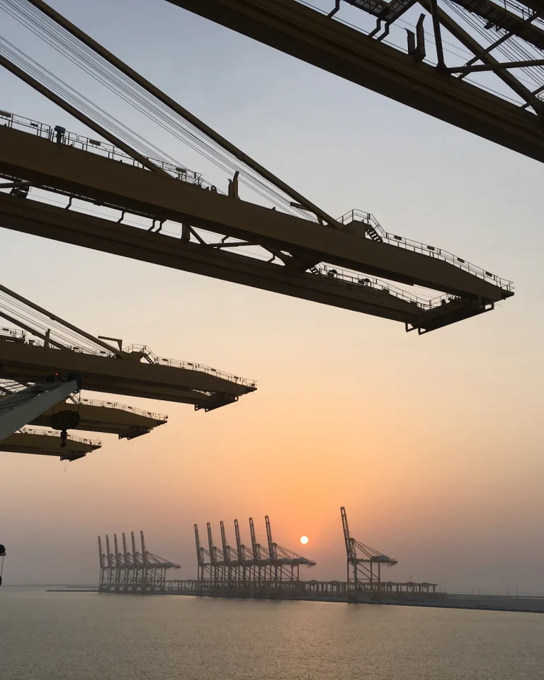 Port cranes at Mina Jebel Ali at sunset