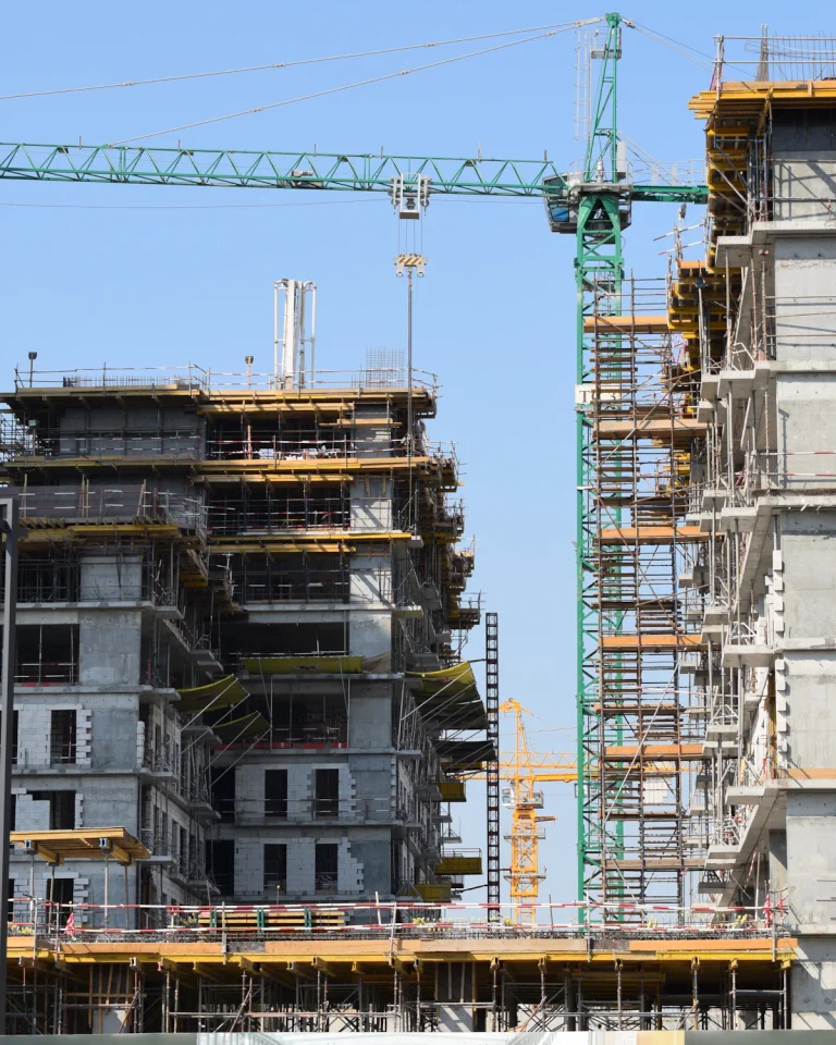 Cranes over a building under construction