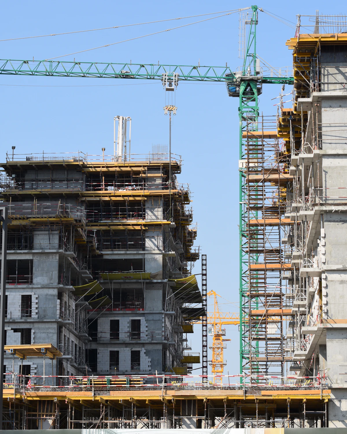 Cranes over a building under construction