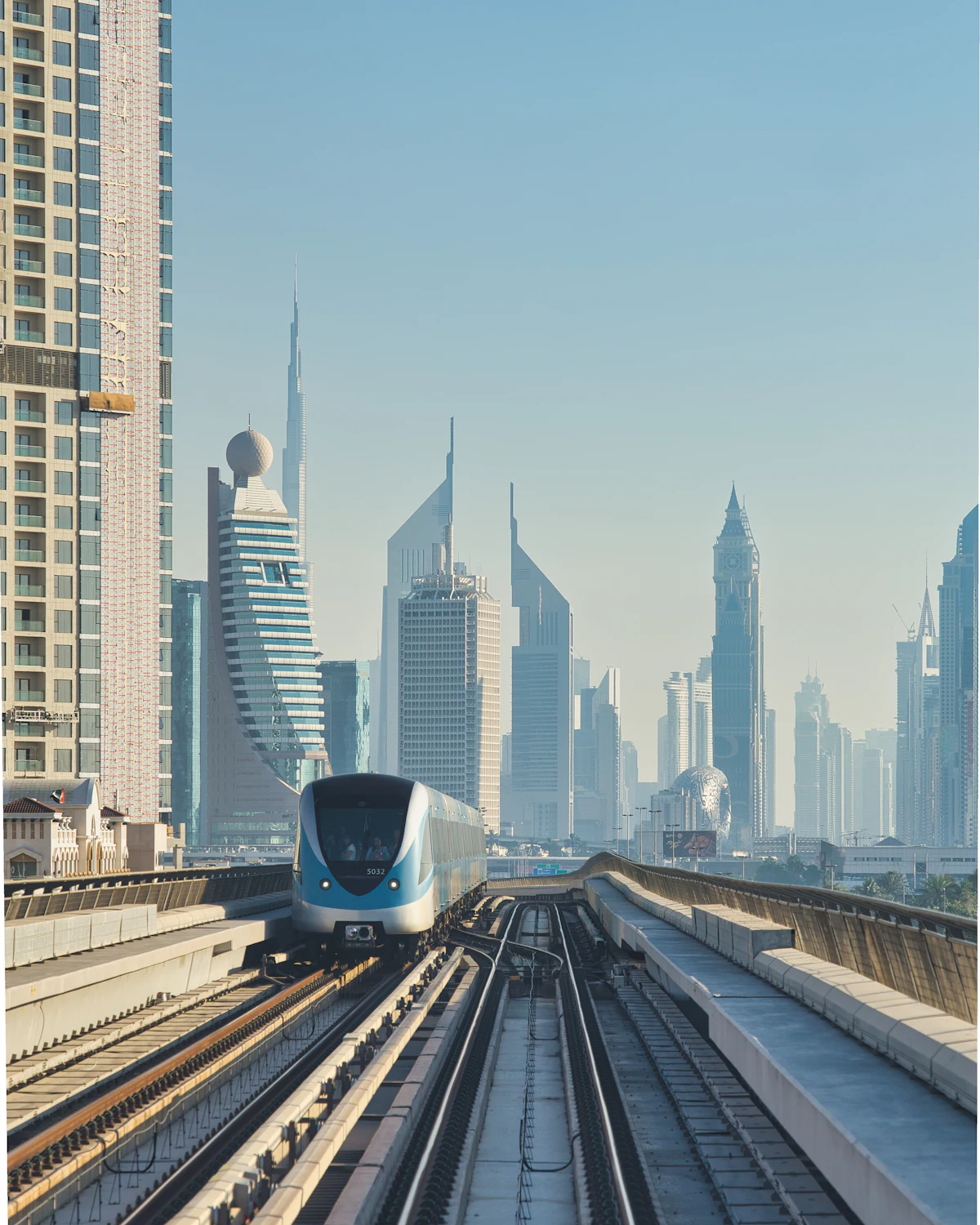 Dubai Metro train with Sheikh Zayed Road towers