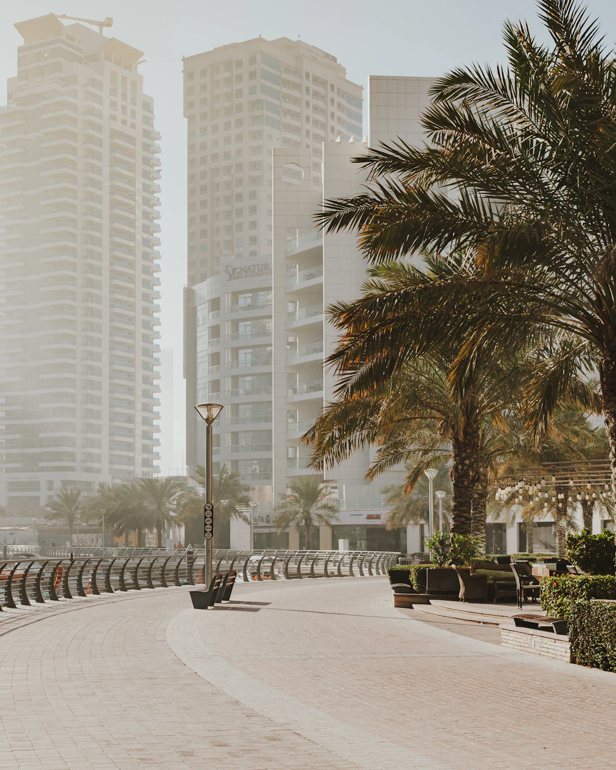 Apartment towers and palm-lined promenade in Dubai