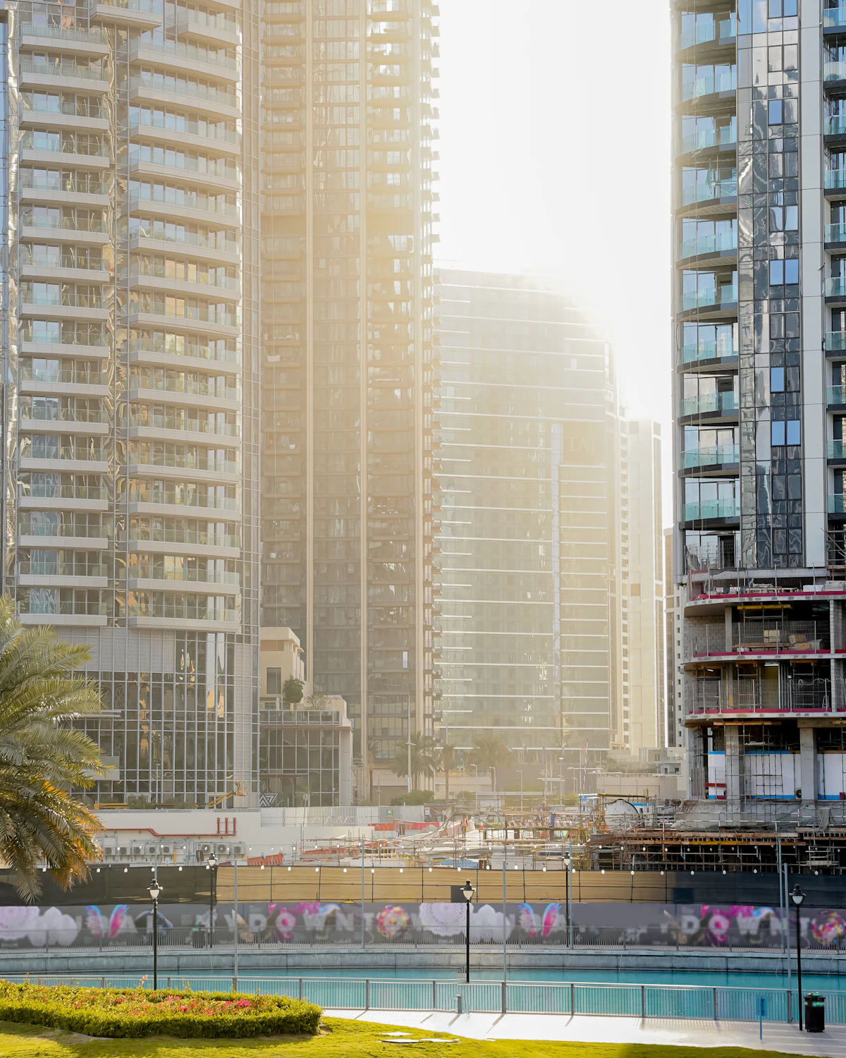 Residential towers above a green park in Dubai